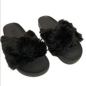 Pink fuzzy slippers
